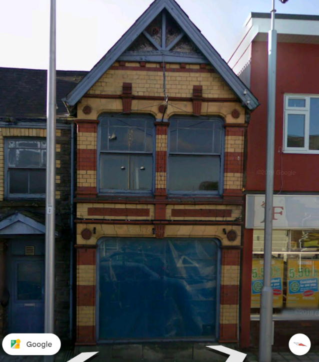 22 College Street window with plastic sheet in November 2008