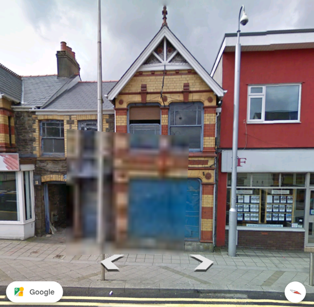 22 College Street window with plastic sheet in July 2011