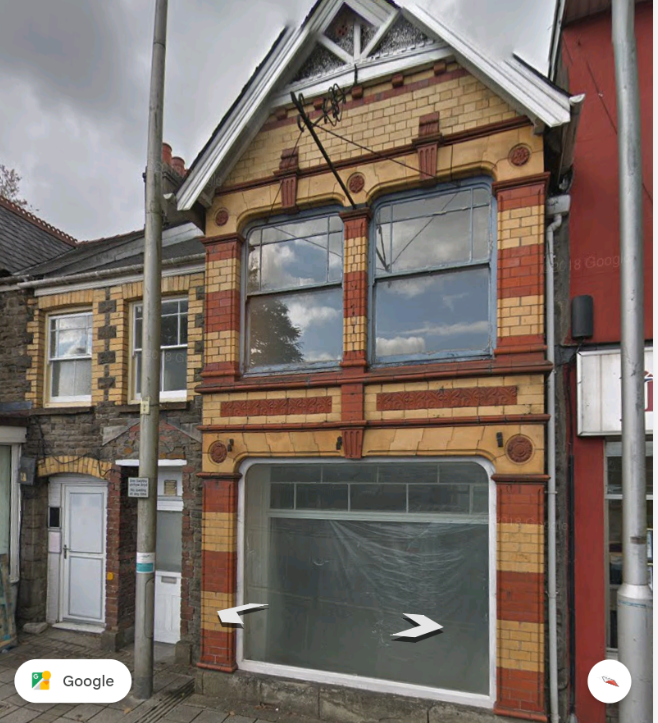 22 College Street window with plastic sheet in August 2018