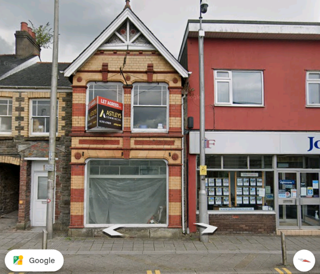 22 College Street window with plastic sheet in July 2021