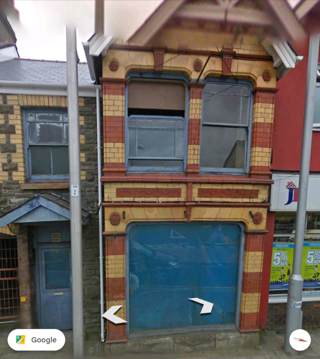 22 College Street window with plastic sheet in September 2009